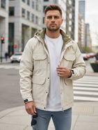 Átmeneti bézs színű kabát stílusos kivitelben