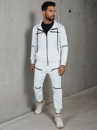 Eredeti fehér tréningruha díszes cipzárakkal