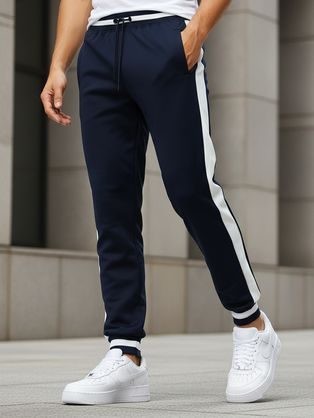 Kék tréningruha alsó kontrasztos csíkokkal