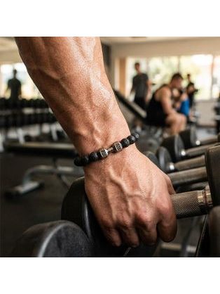 Elegáns fekete kabát kétsoros rögzítéssel