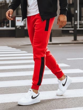 Piros melegítő fekete oldalsó csíkkal