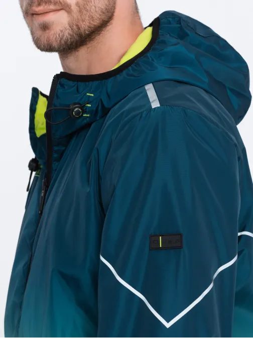 Sport átmeneti kabát fényvisszaverő elemekkel türkiz v1 om-janp-0105
