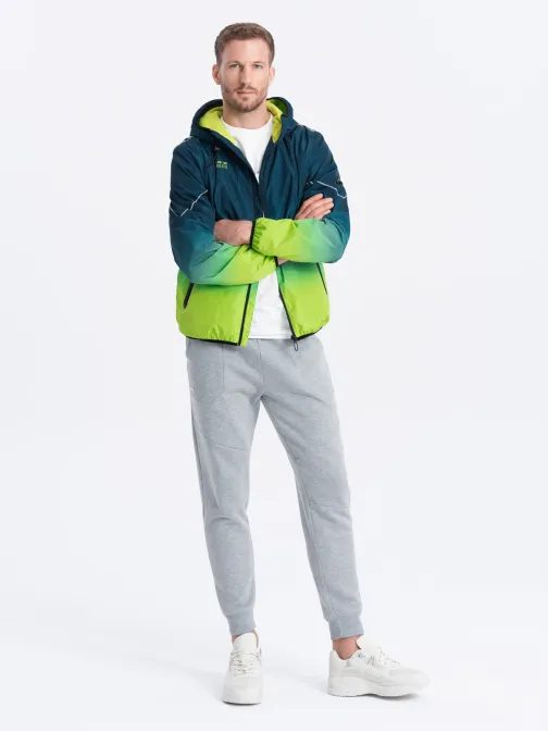 Sport átmeneti kabát fényvisszaverő elemekkel türkiz v1 om-janp-0105