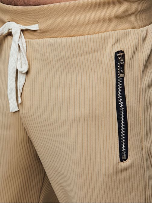 Szemet gyönyörködtető bézs zsebkoscogó