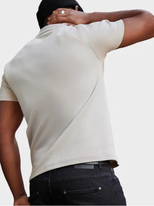 Krémszínű pólóing dekoratív cipzárral V3 POSS-0109