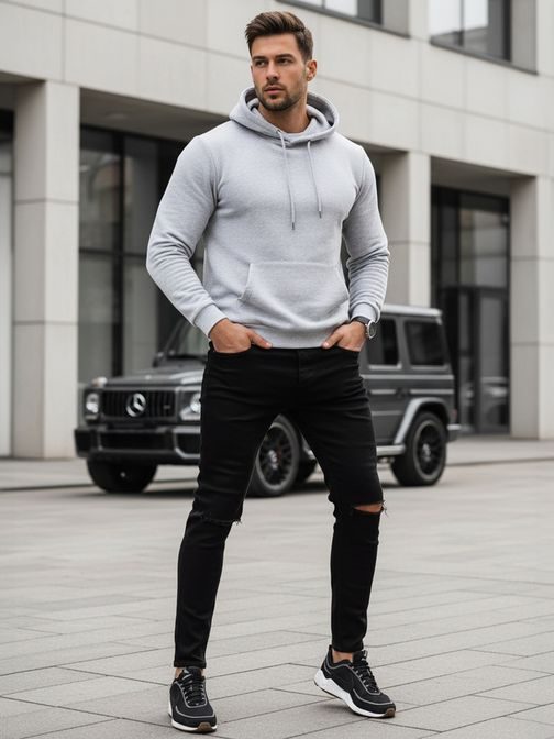 Trendi fekete farmer tépett részekkel