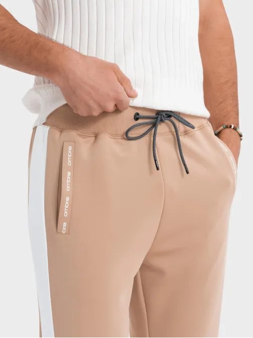 Férfi bézs színű tréningnadrág kontrasztos szegéllyel V4 PASK-0229