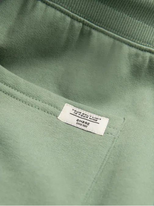 Érdekes zöld melegítő nadrág V3 PABS-0206