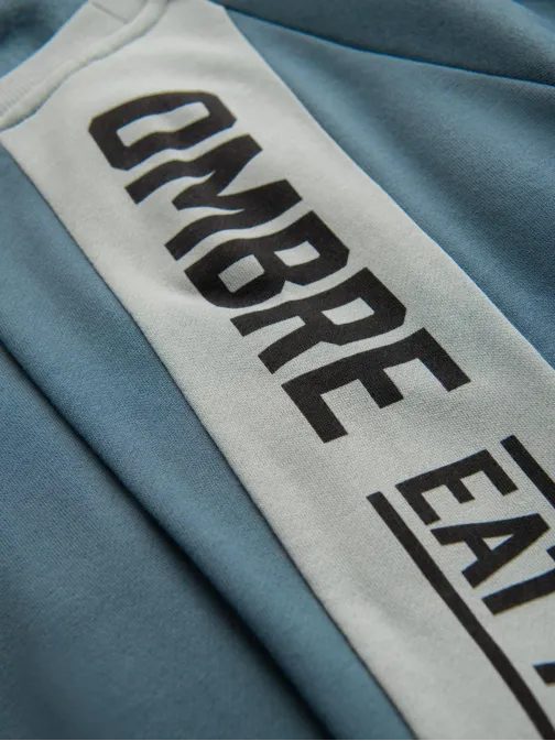 Divatos kék kapucnis pulóver dekoratív ujjakkal V1 OM-SSNZ-0200