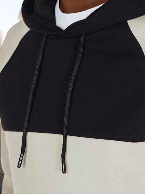 Férfi krém és fekete kapucnis pulóver kapucnival