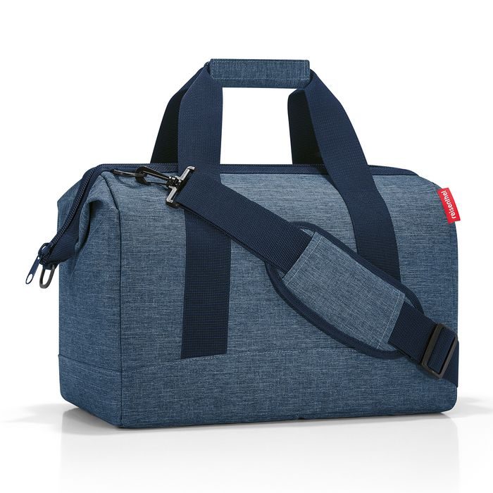 REISENTHEL, CESTOVNÁ TAŠKA ALLROUNDER M TWIST BLUE 18 L - CESTOVNÉ TAŠKY - CESTOVNÉ  KUFRE A TAŠKY