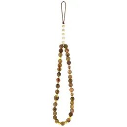 Obal / kryt na Apple iPhone 17 Pro hnědý - Strap GUESS