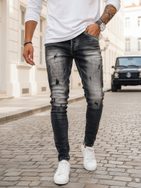 Stilske sive kavbojke z luknjami