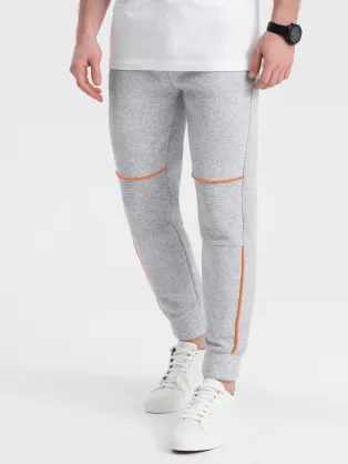 Udobne trenirke s prešivanjem v sivi barvi meliert om-pask-0145