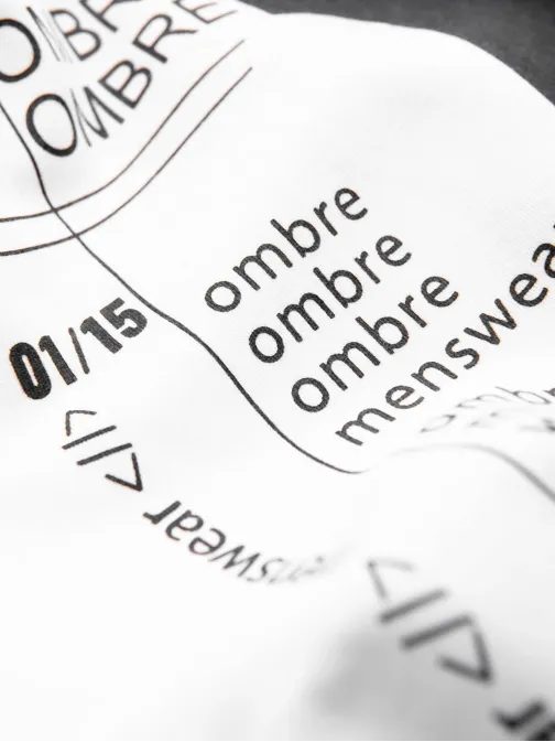 Zanimiv bel pulover z napisom V1 SSPS-0152