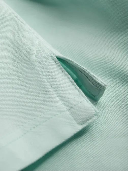 Bombažna svetlo zelena polo majica z nežnim napisom V1 S1746