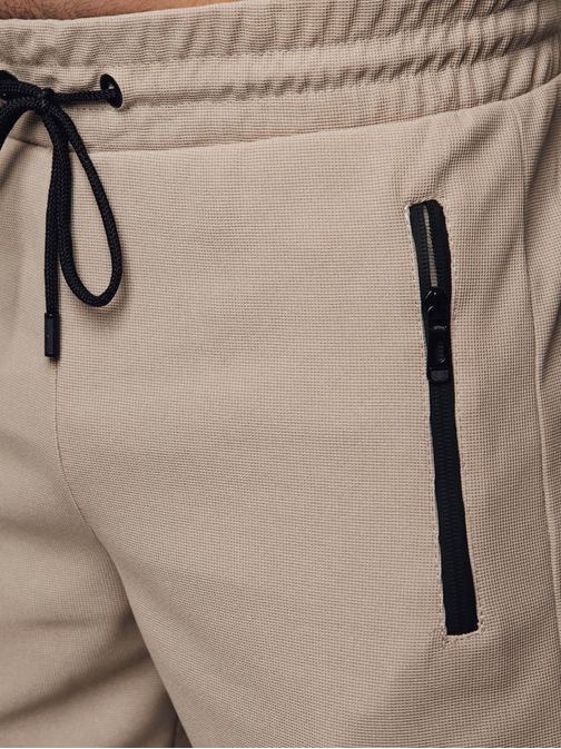 Moške joggerje z žepi v bež barvi
