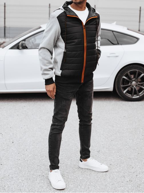 Črna prehodna jakna z značilno zadrgo