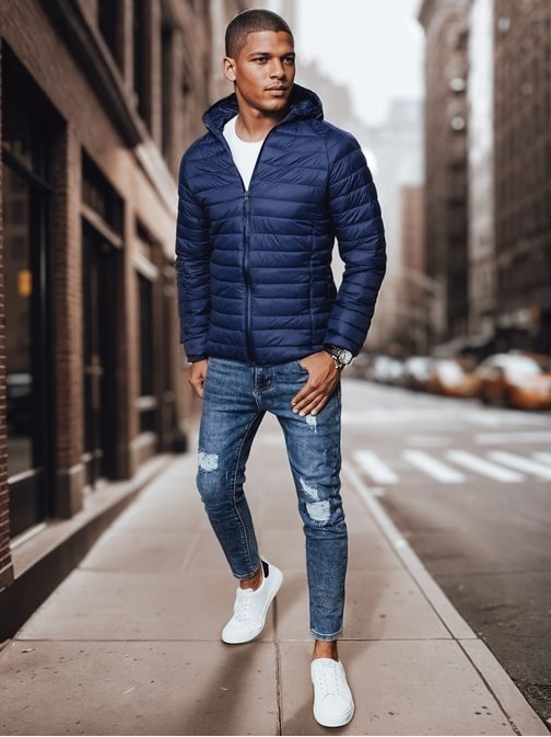 Prešita mornarsko modra prehodna jakna s kapuco