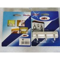 věšák 3-háčky výkyvný, samolep. /22.02.27./