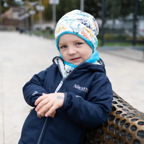 ESITO Zimní čepice spadená Dinouši - tyrkysová