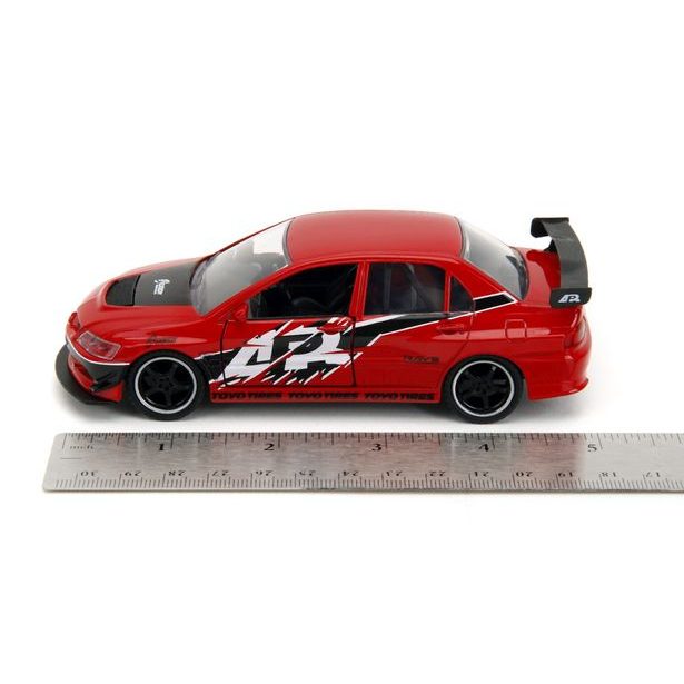 Rychle a zběsile Twin Pack 2006 Mitsubishi Lancer Evo IX + Brianův 2002 Nissan Skyline GTR R34, 1:32 Wave 4/2