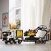 Nákladní auto Volvo FMX a elektrický bagr Volvo EC230