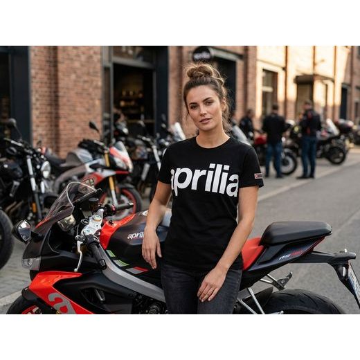 APRILIA DÁMSKÉ TRIČKO BIG LOGO - ČERNÁ 2026 - DÁRKY PRO FANOUŠKY APRILIA - NA MOTORKÁŘE