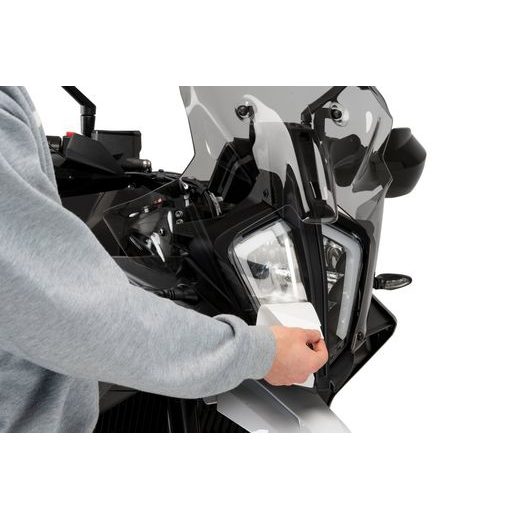 SAMOLEPICÍ CHRÁNIČ SVĚTLOMETU PUIG 21613W PRŮHLEDNÝ - PLEXI ŠTÍTY - NA MOTORKU