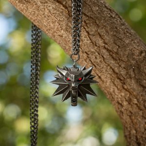 ZAKLÍNAČSKÝ MEDAILON VLK AMULET - SVÍTÍCÍ OČI - THE WITCHER  - ZAKLÍNAČ{% if kategorie.adresa_nazvy[0] != zbozi.kategorie.nazev %} - LICENCOVANÉ ZBOŽÍ - FILMY, HRY, SERIÁLY{% endif %}