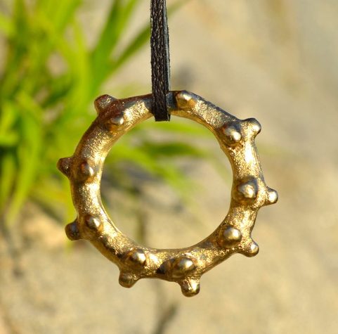 KELTSKÝ AMULET, OZUBENÉ KOLO, LOŠÁNKY, BRONZ