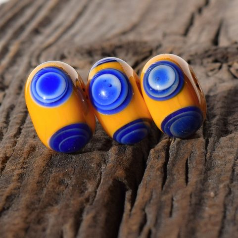 KELTSKÝ KORÁLEK S DVOJITÝMI OČKY, REPLIKA HALLSTAT