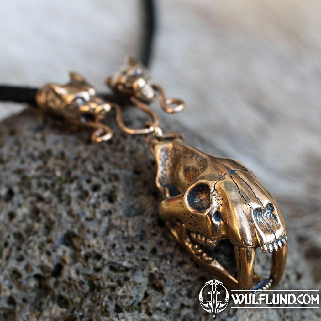 Leather necklace with saber tooth pendant with with carved lion's hea