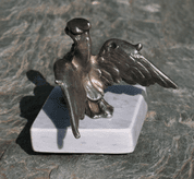 GRIFFIN ON A STONE PEDESTAL, TIN - PEWTER FIGURES