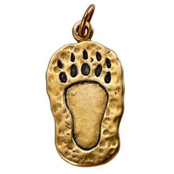 Bear Print, bronze pendant
