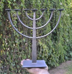 Menorah, forged seven-branched candlestick
