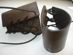 PAIR OF BROWN  LEATHER BRACERS