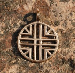 SUN SYMBOL, Hallstatt culture, bronze pendant