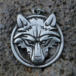 Wolf's head in a ring, zinc pendant, antique silver