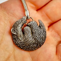 BADGER, pendant, zinc