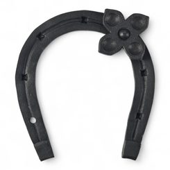 Forged horseshoe with four-leaf clover