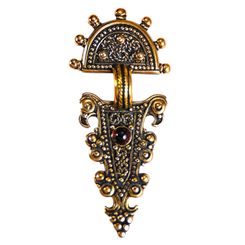 Têtes d'aigle, Faibule du haut Moyen Âge refaite comme un pendentif, bronze