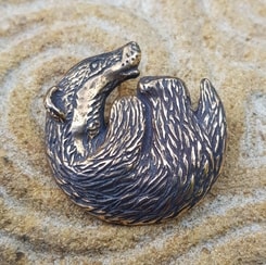 BADGER, pendant, bronze