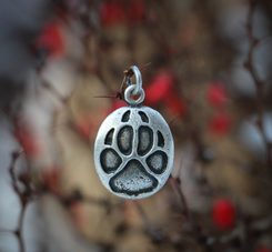 WOLF TRACK, pendant, zinc, ant. brass
