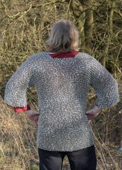 Medieval coif made of riveted armour