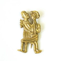 Flute player, medieval pilgrim badge