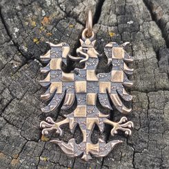 Pendentif serpent enroulé, bronze