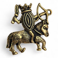 Vulva on horseback, medieval pilgrim brooch, bronze