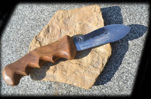 Forged knife with wooden handle, universal usage