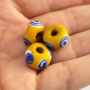 CELTIC GLASS BEAD, yellow with eyelets, replica